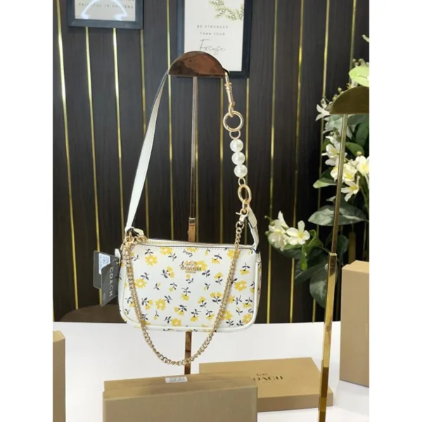 Premium Coach Nolita Bag Yellow Beige With Box For Women (BOT2573) - stayhit.in Premium Coach Nolita Bag Yellow Beige With Box For Women (BOT2573) - stayhit.in