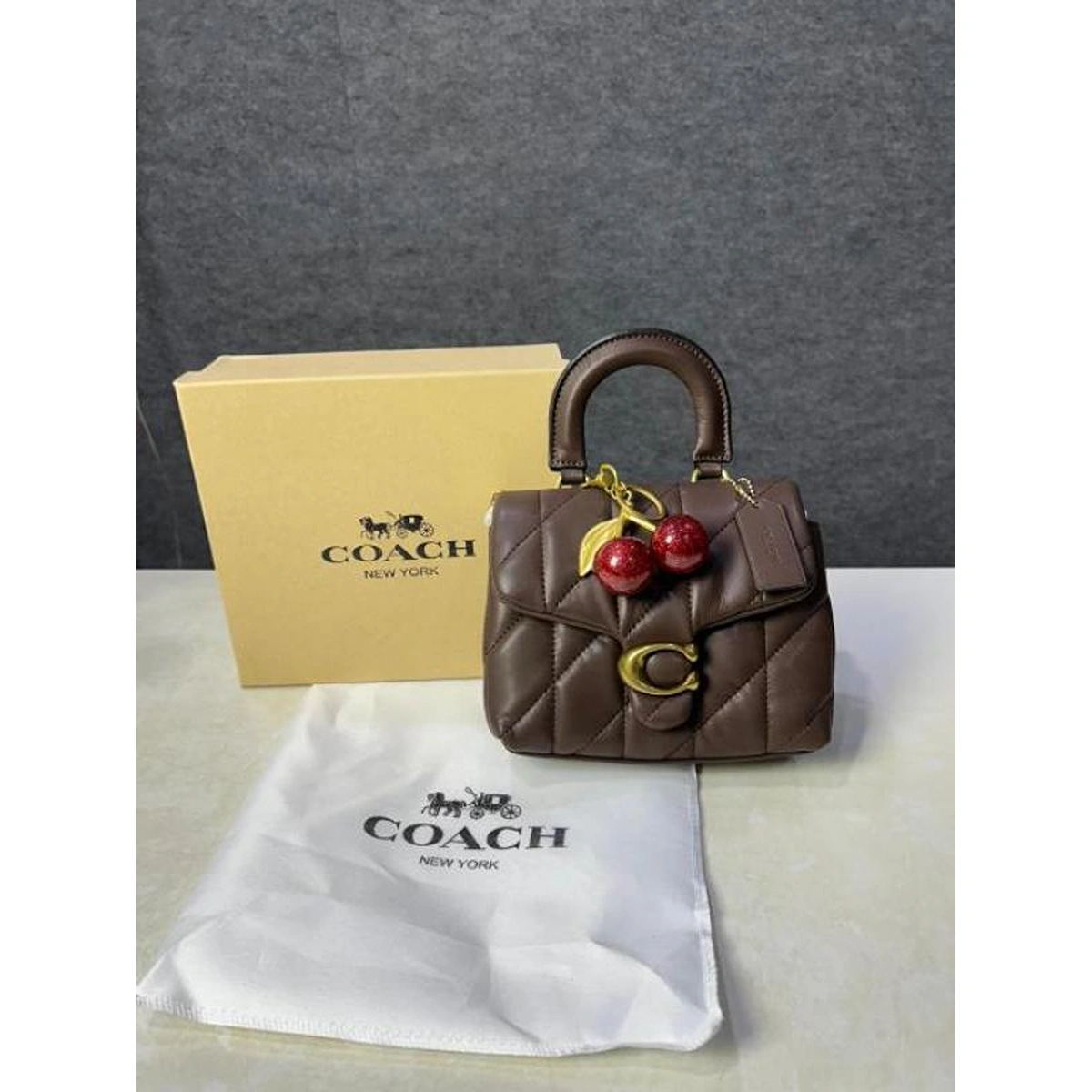 Premium Coach Tabby Leather Bag Cherry Charm With Box For Women (BOT3825) - stayhit.in Premium Coach Tabby Leather Bag Cherry Charm With Box For Women (BOT3825) - stayhit.in